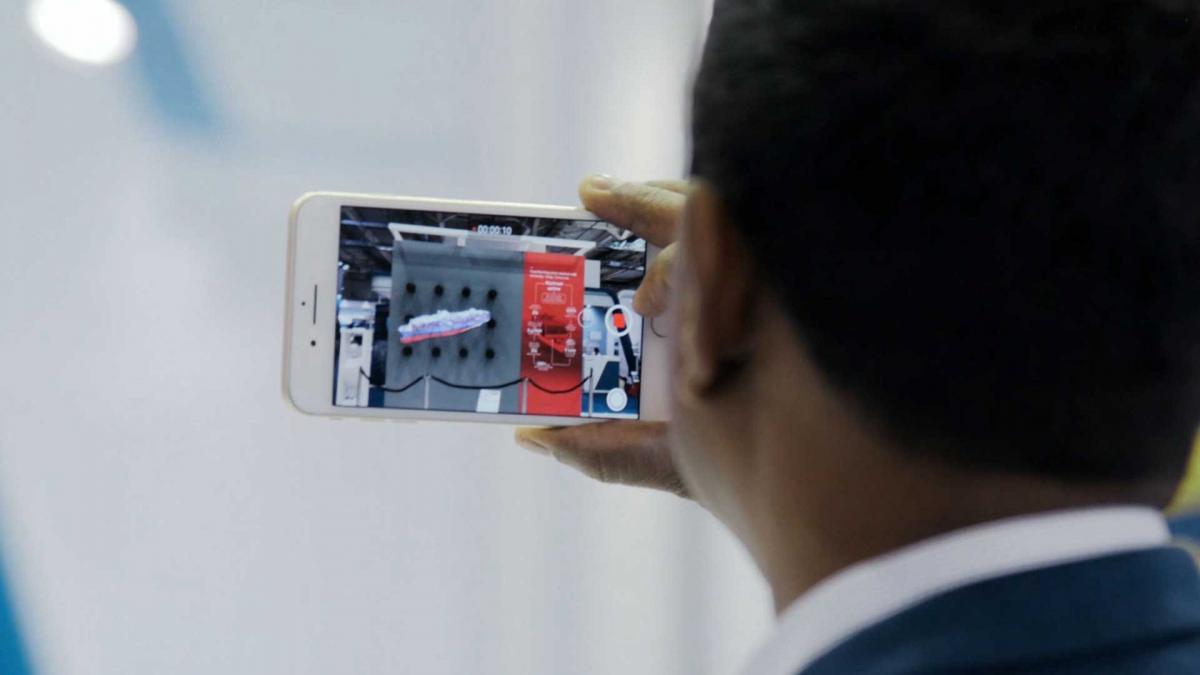 Visitors filming the HYPERVSN Wall